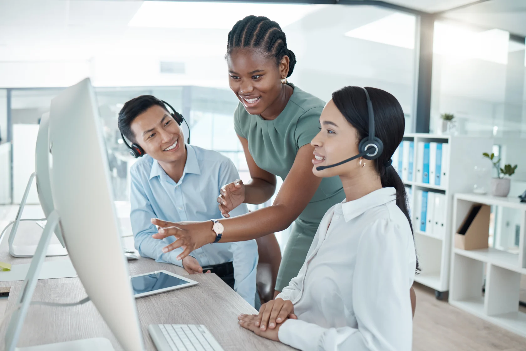 Call center, customer service worker and teamwork or training and coaching with manager on client call Diversity, headset and computer to work, consulting and telemarketing, leadership and support